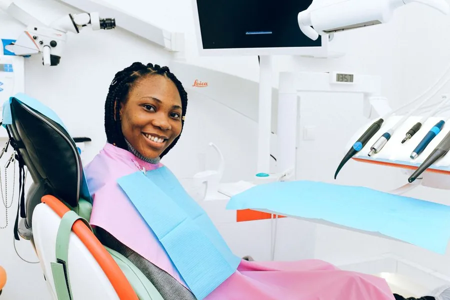 Relaxed smiling patient at her gentle teeth cleaning in Fort Myers